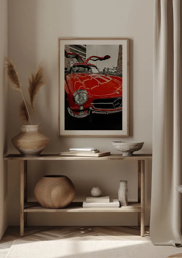 Een foto van een rode Mercedes SL300 Met Vleugeldeuren Schilderij van CollageDepot op een plank dient als prachtige wanddecoratie.,Lichtbruin