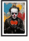 Een portret van een persoon die clownmake-up draagt en een zwarte outfit met een rood hart. Op de achtergrond zijn blauwe, gele en rode harten met verfspatten te zien, die doen denken aan levendige graffitikunst. De afbeelding is zwart ingelijst en ontworpen als unieke wanddecoratie. Dit boeiende stuk is het Graffiti Joker Schilderij van CollageDepot.,Zwart-Met,Lichtbruin-Met,showOne,Met